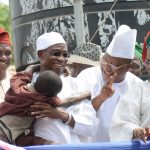 PHOTO NEWS: Aregbesola Discovers a Passionate Toddler Fan Of APC In Osun