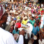 PHOTO NEWS: Aregbesola Engages In Door To Door Campaign For Buhari/Osibajo